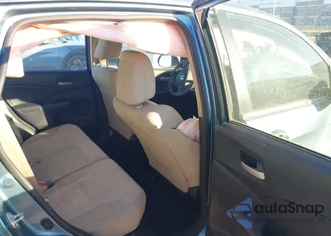 2015 Honda Cr-V Lx z USA, uszkodzony, nr VIN 5J6RM4H34FL082396